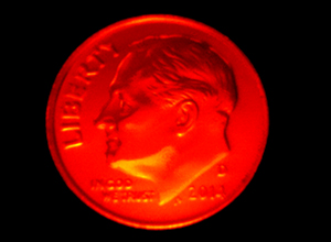 Снимок десятицентовой монеты США, выполненный стандартным объективом на TiX560